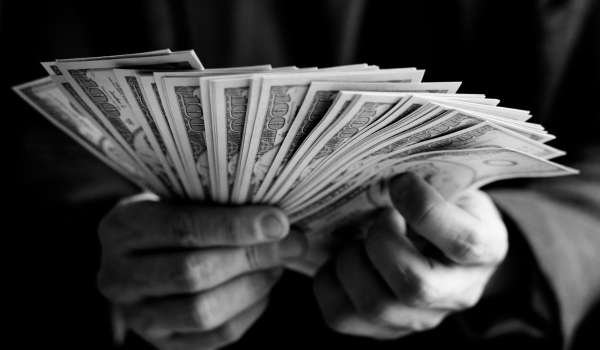 closeup-hands-holding-cash (1)